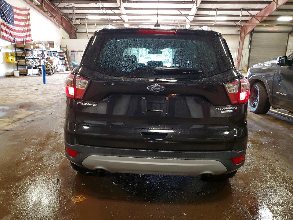 Photo 6 from auction – 2017 FORD ESCAPE with VIN 1FMCU9J90HUE10252