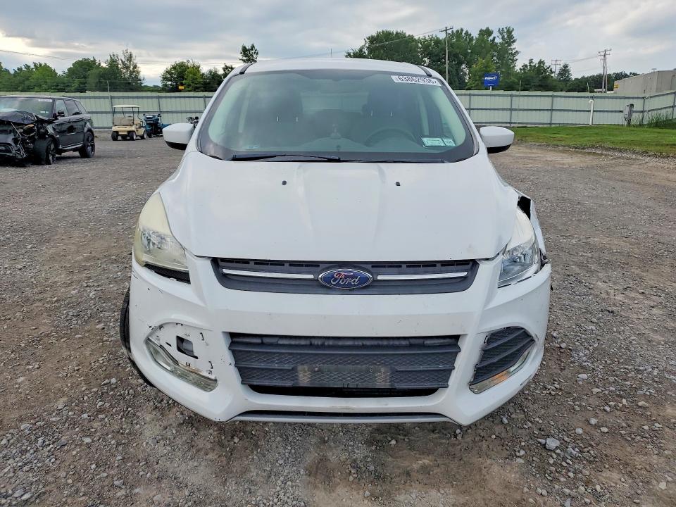 Photo 5 from auction – 2015 FORD ESCAPE with VIN 1FMCU9G95FUA11454