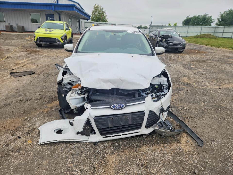 Photo 5 from auction – 2014 FORD FOCUS with VIN 1FADP3F20EL411112