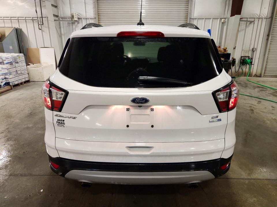 Photo 6 from auction – 2018 FORD ESCAPE with VIN 1FMCU9GD9JUC35579