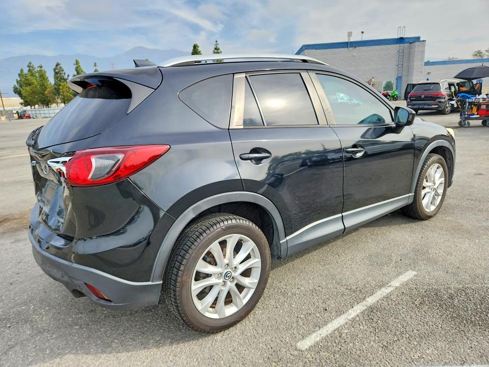 Photo 3 from auction – 2014 MAZDA CX-5 with VIN JM3KE2DY9E0323189