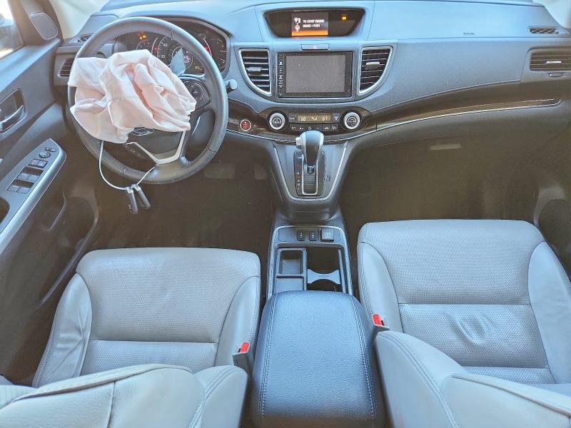 Photo 8 from auction – 2016 HONDA CR-V with VIN 5J6RM3H70GL023442