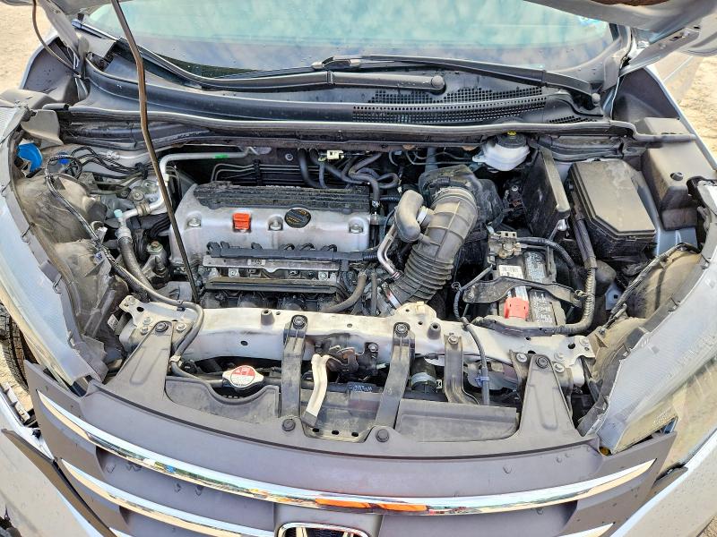Photo 12 from auction – 2014 HONDA CR-V with VIN 2HKRM3H75EH516251