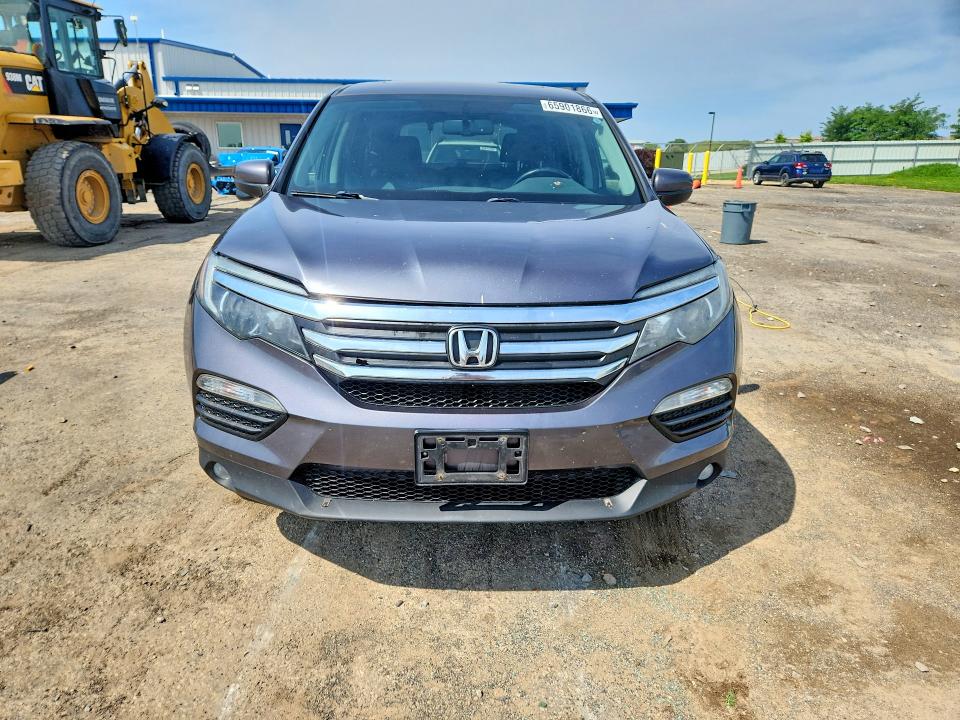 Photo 5 from auction – 2016 HONDA PILOT with VIN 5FNYF6H56GB093283