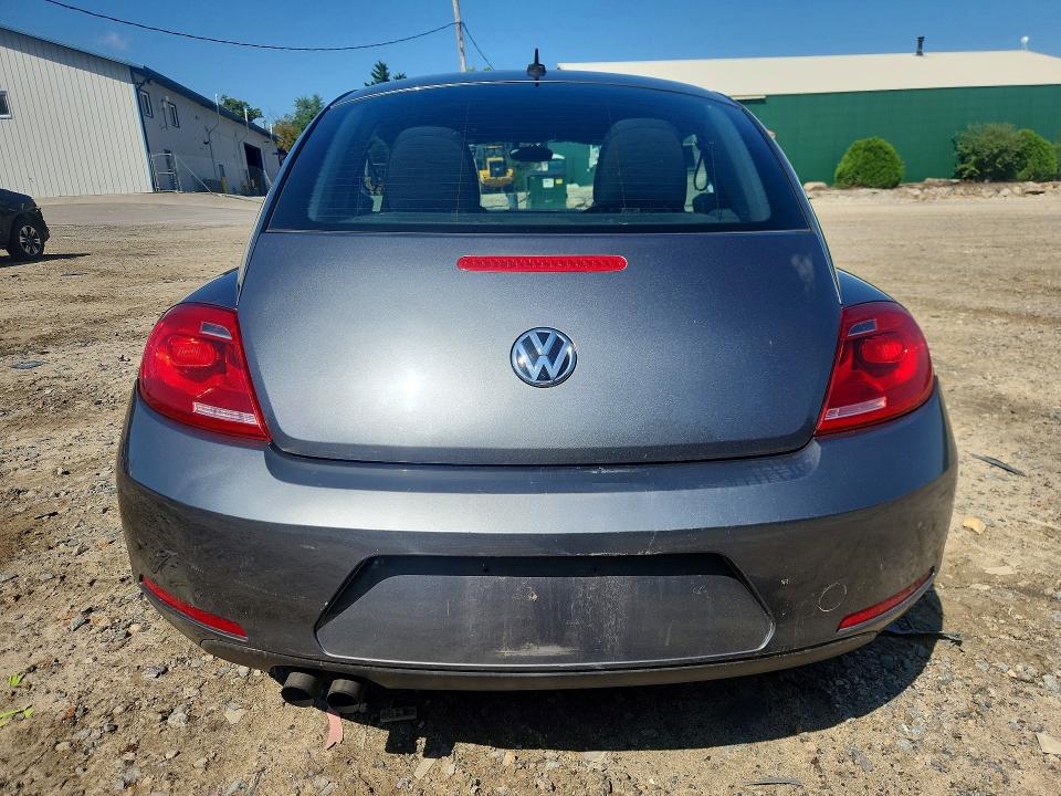 Photo 6 from auction – 2014 VOLKSWAGEN BEETLE with VIN 3VWF17AT8EM638653
