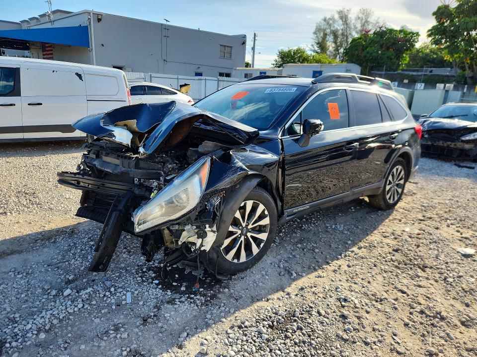 SUBARU OUTBACK 2015 with VIN 4S4BSBNCXF3271734 - Photo from auction