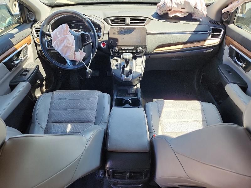 Photo 8 from auction – 2017 HONDA CR-V with VIN 7FARW1H81HE008065