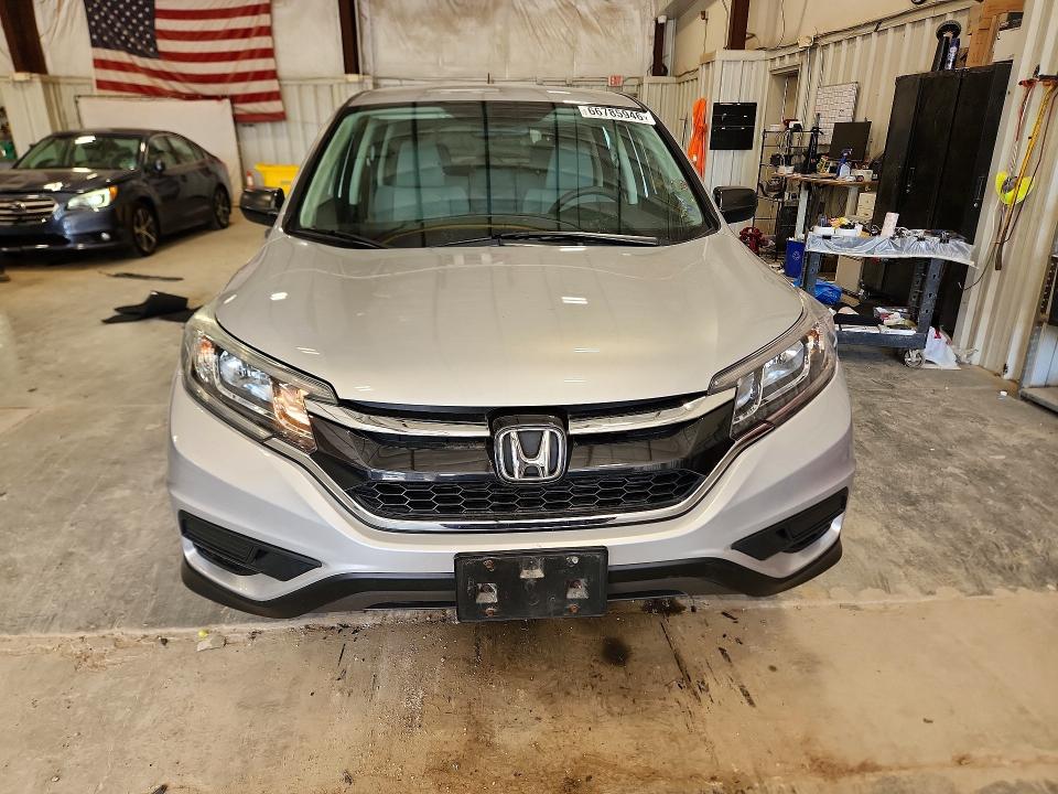 Photo 5 from auction – 2016 HONDA CRV LX with VIN 5J6RM4H34GL001527