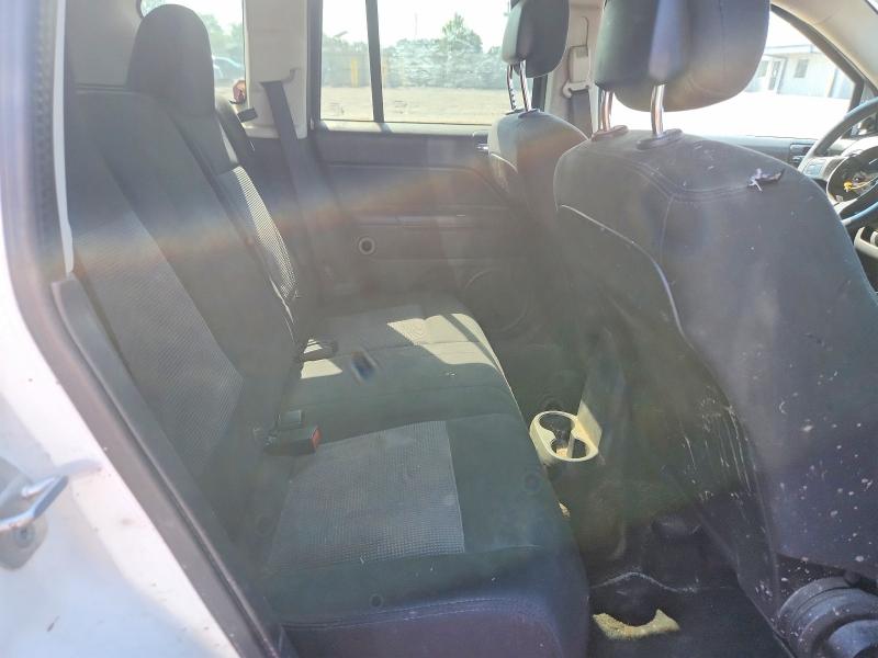 Photo 10 from auction – 2014 JEEP COMPASS with VIN 1C4NJDBB2ED503876