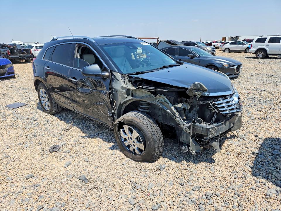 Photo 4 from auction – 2015 CADILLAC SRX with VIN 3GYFNEE33FS535573