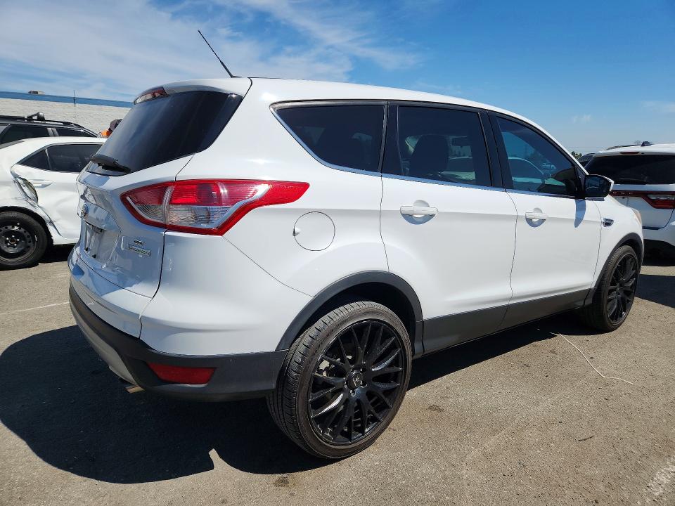 Photo 3 from auction – 2014 FORD ESCAPE with VIN 1FMCU0GX9EUD32356