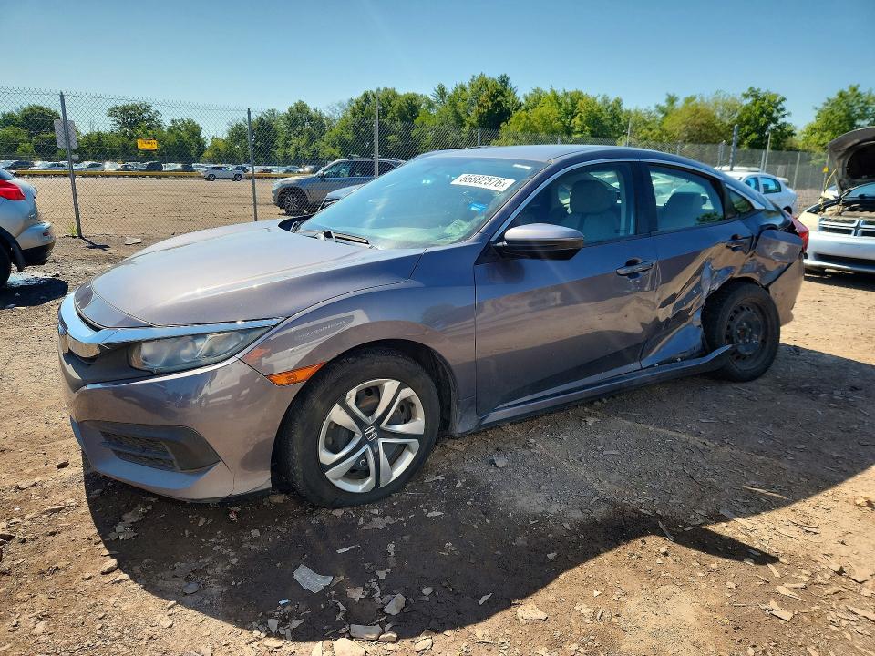 HONDA CIVIC 2018 with VIN 19XFC2F5XJE011452 - Photo from auction