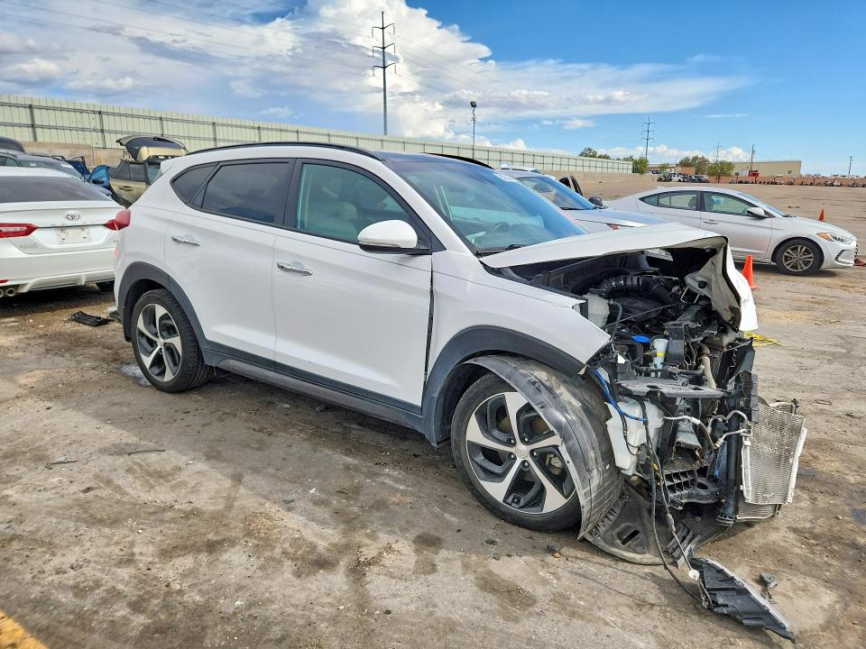 Photo 4 from auction – 2016 HYUNDAI TUCSON with VIN KM8J33A23GU083418