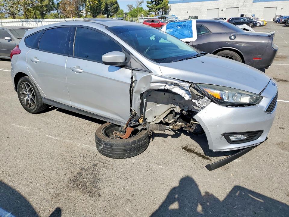 Снимка 4 от търг – 2017 FORD FOCUS с VIN 1FADP3M21HL290419