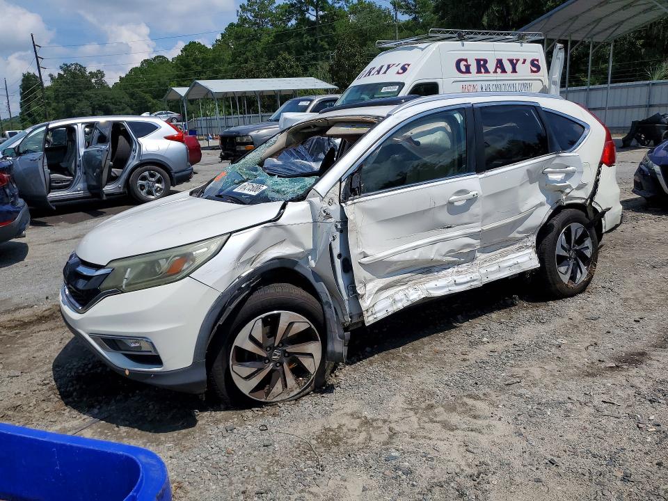 HONDA CR-V 2015 with VIN 5J6RM3H99FL006204 - Photo from auction