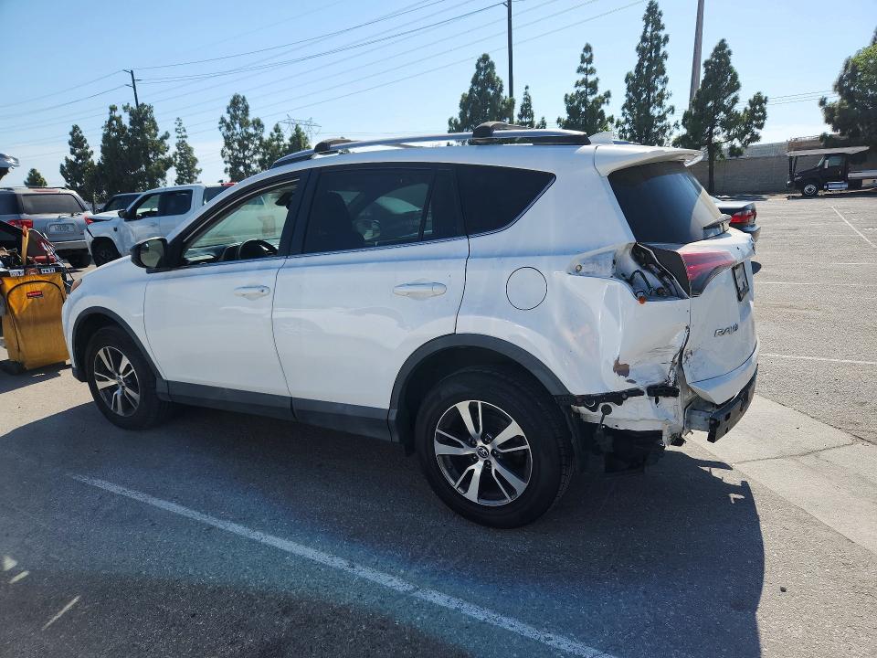 Photo 2 from auction – 2018 TOYOTA RAV4 with VIN 2T3ZFREV2JW415106