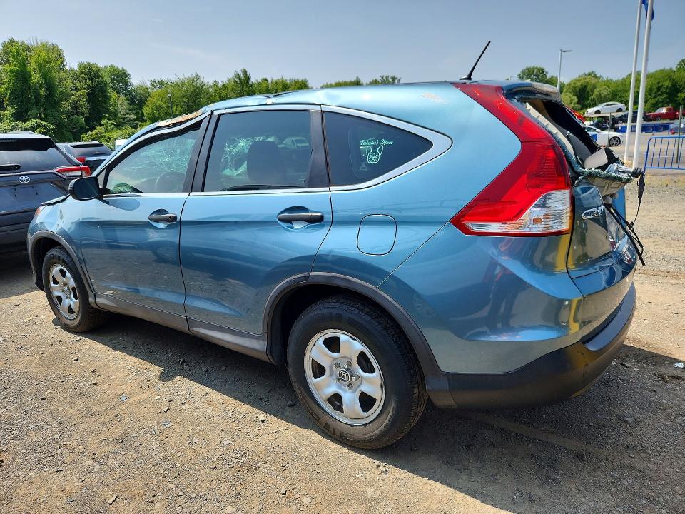 Photo 2 from auction – 2014 HONDA CR-V with VIN 2HKRM4H31EH660463