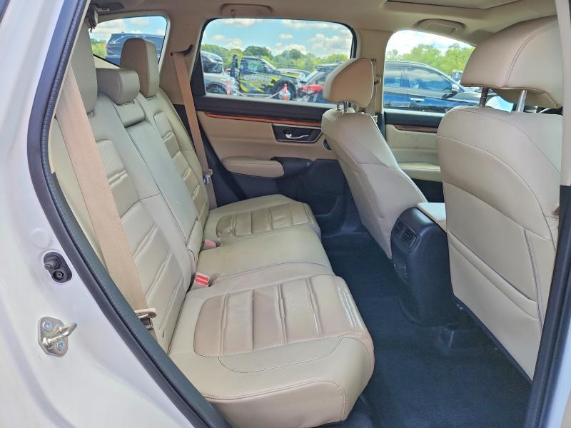 Photo 11 from auction – 2018 HONDA CR-V with VIN 5J6RW2H86JL018248