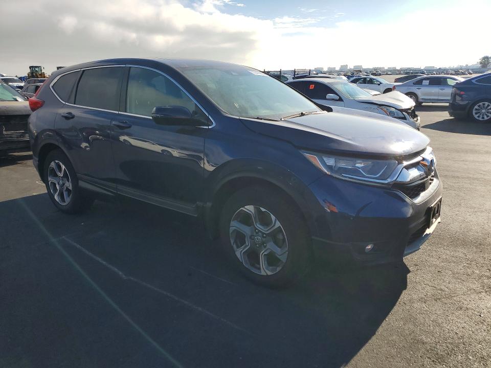 Photo 4 from auction – 2017 HONDA CR-V with VIN 5J6RW1H89HL009693