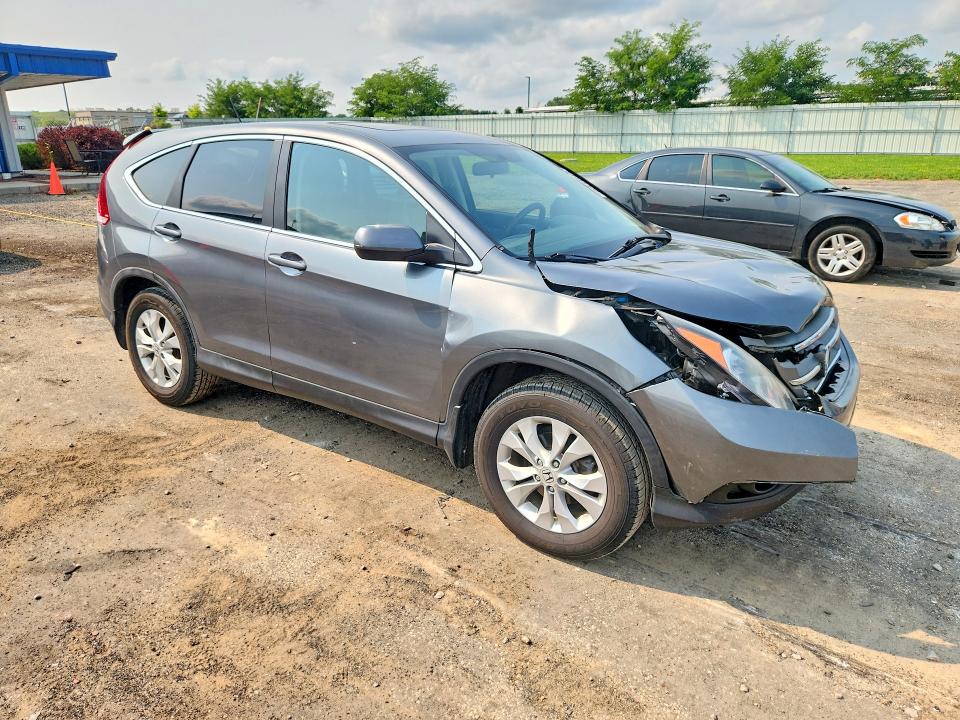 Photo 4 from auction – 2014 HONDA CR-V with VIN 5J6RM4H59EL073466