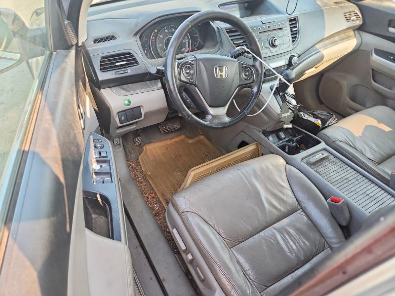 Photo 8 from auction – 2012 HONDA CR-V with VIN 2HKRM3H76CH505059