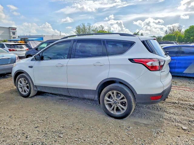 Photo 2 from auction – 2018 FORD ESCAPE with VIN 1FMCU0GD6JUD38289