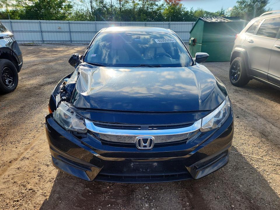 Photo 5 from auction – 2016 HONDA CIVIC with VIN 19XFC2F54GE008619