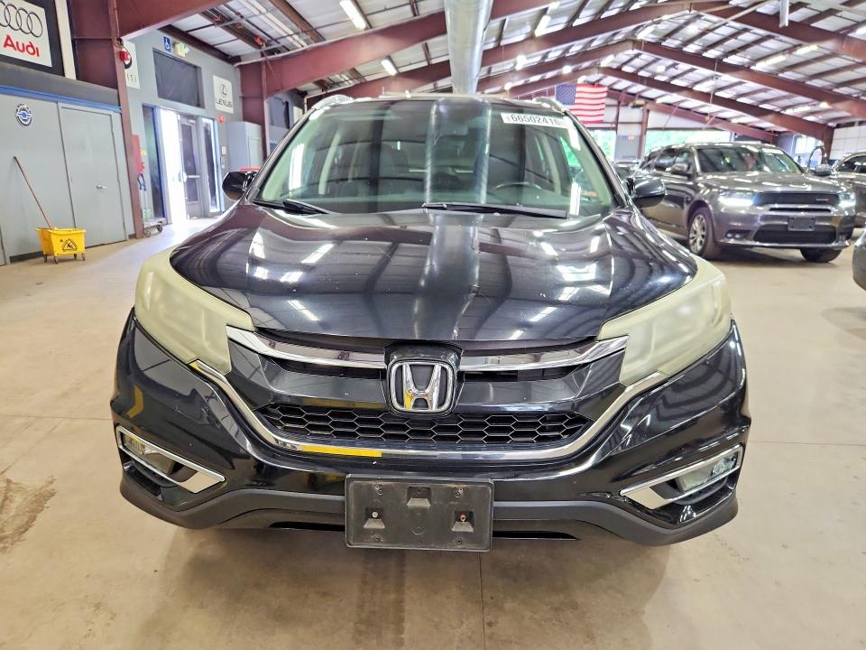 Photo 5 from auction – 2015 HONDA CR-V with VIN 5J6RM4H74FL101564