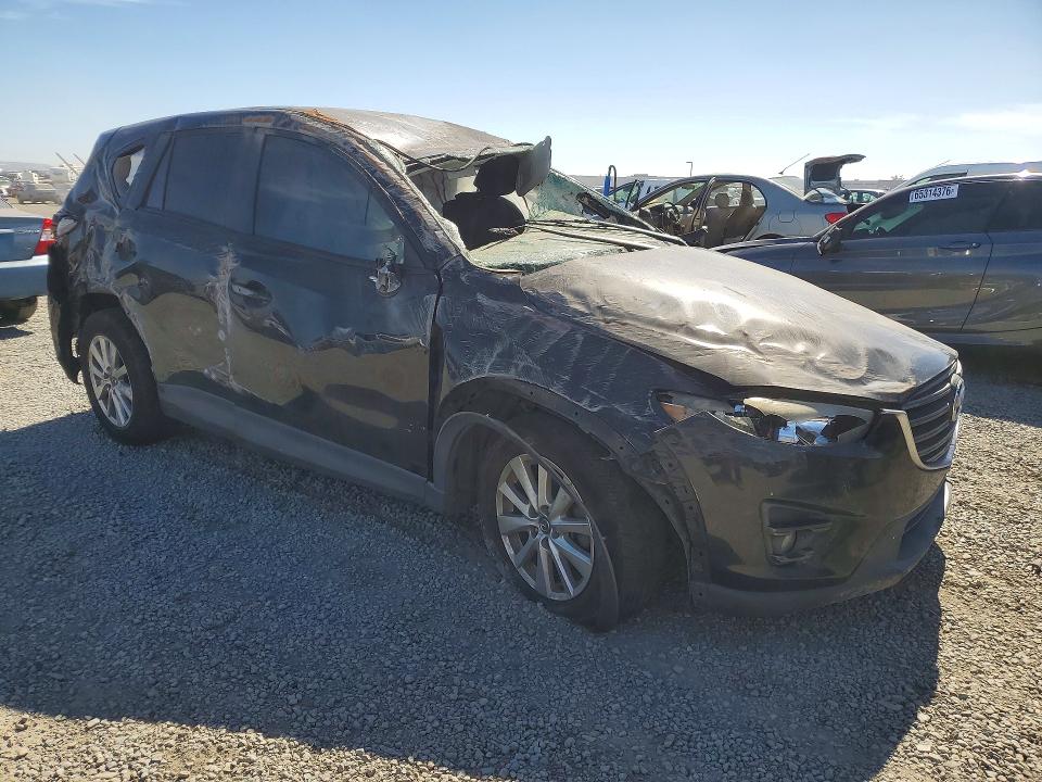 Photo 4 from auction – 2016 MAZDA CX-5 with VIN JM3KE2CY8G0616005