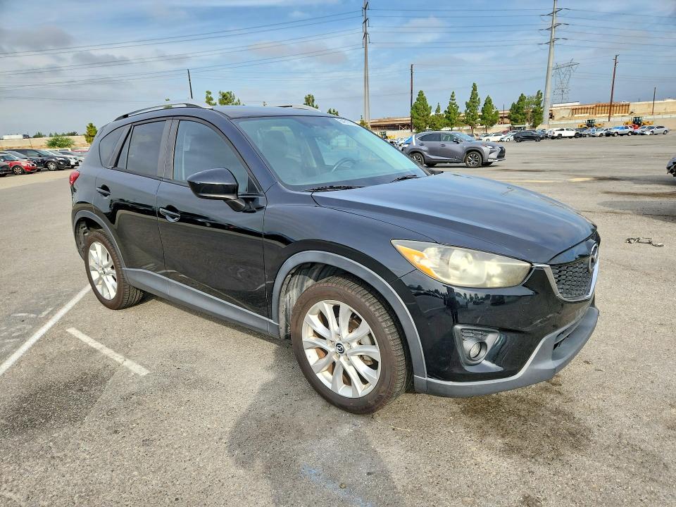 Photo 4 from auction – 2014 MAZDA CX-5 with VIN JM3KE2DY9E0323189