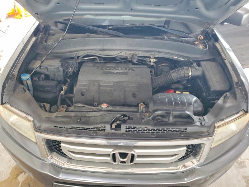 Photo 11 from auction – 2011 HONDA RIDGELINE with VIN 5FPYK1F55BB006538