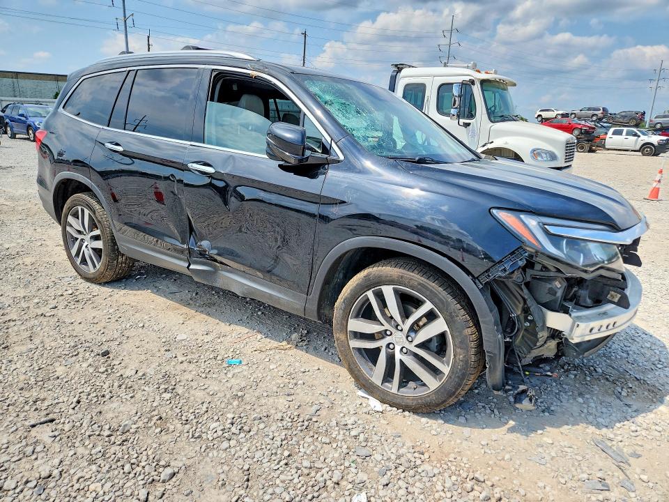 Photo 4 from auction – 2017 HONDA PILOT with VIN 5FNYF6H90HB081103