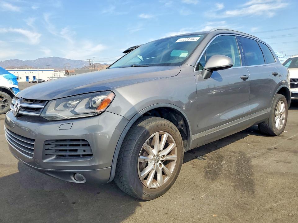 VOLKSWAGEN TOUAREG 2012 with VIN WVGEF9BP2CD011934 - Photo from auction