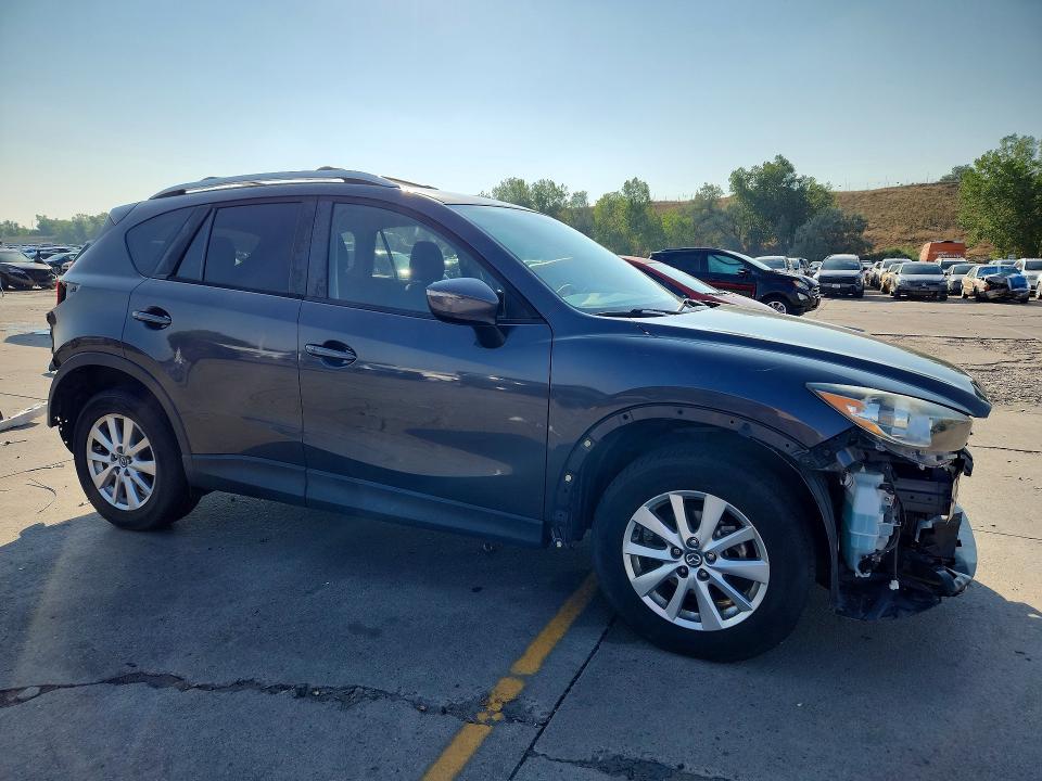 Photo 4 from auction – 2016 MAZDA CX-5 with VIN JM3KE2BYXG0670892