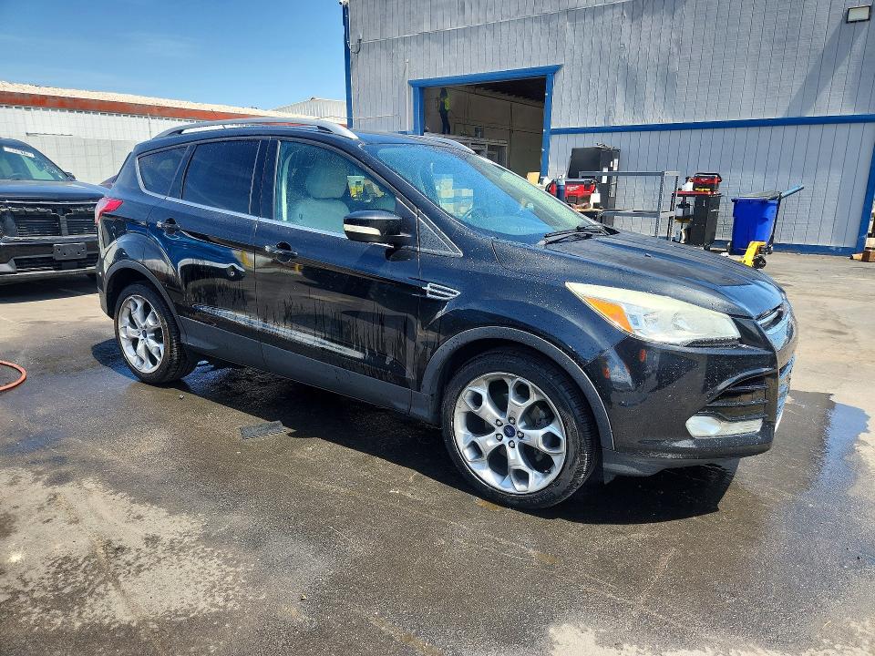 Photo 4 from auction – 2014 FORD ESCAPE with VIN 1FMCU0JX5EUD77531