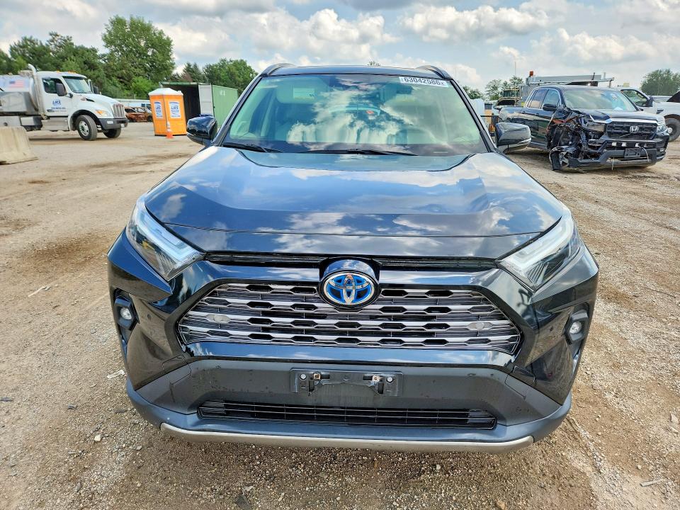 Photo 5 from auction – 2022 TOYOTA RAV4 with VIN JTMD6RFV0ND059296