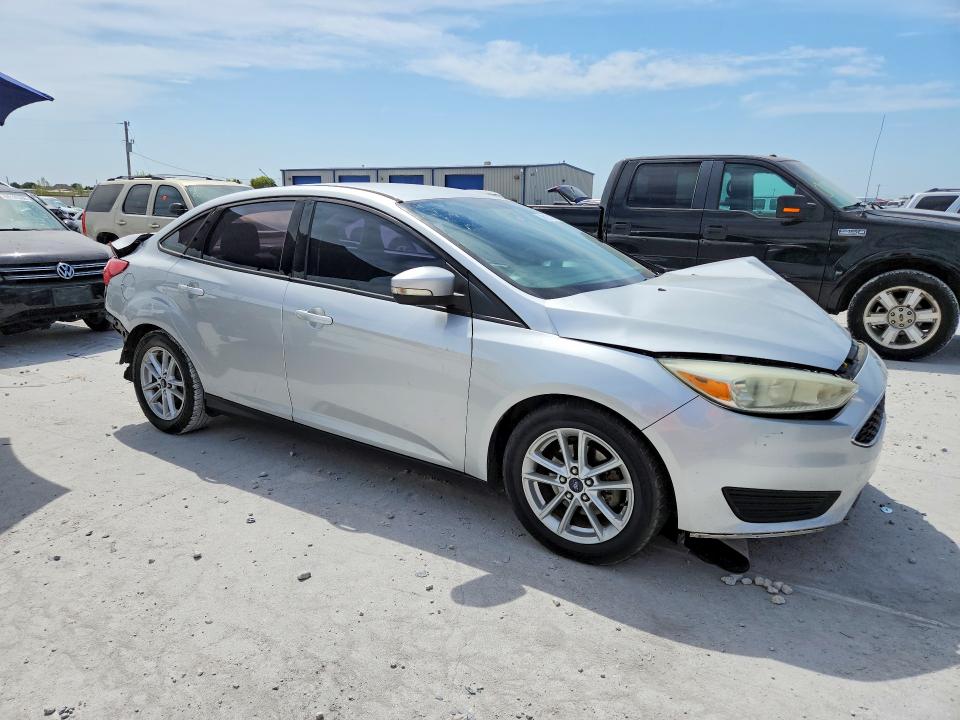 Photo 4 from auction – 2015 FORD FOCUS with VIN 1FADP3F2XFL257199
