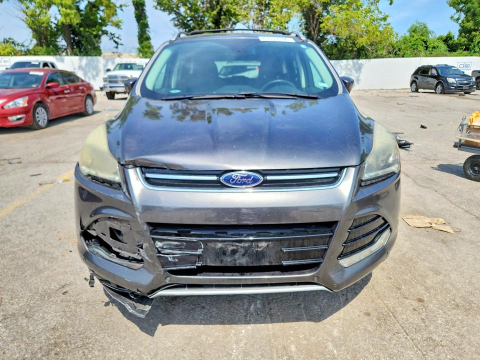 Foto 5 de la subasta – 2016 FORD ESCAPE con VIN 1FMCU9JXXGUA08414