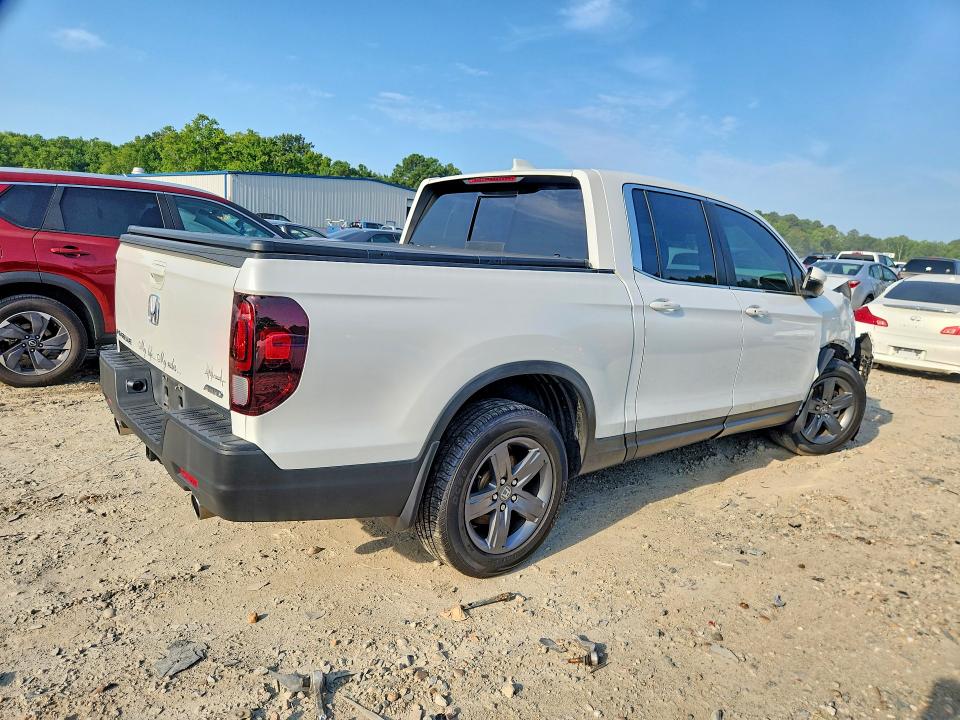 Photo 3 from auction – 2022 HONDA RIDGELINE with VIN 5FPYK3F50NB029578