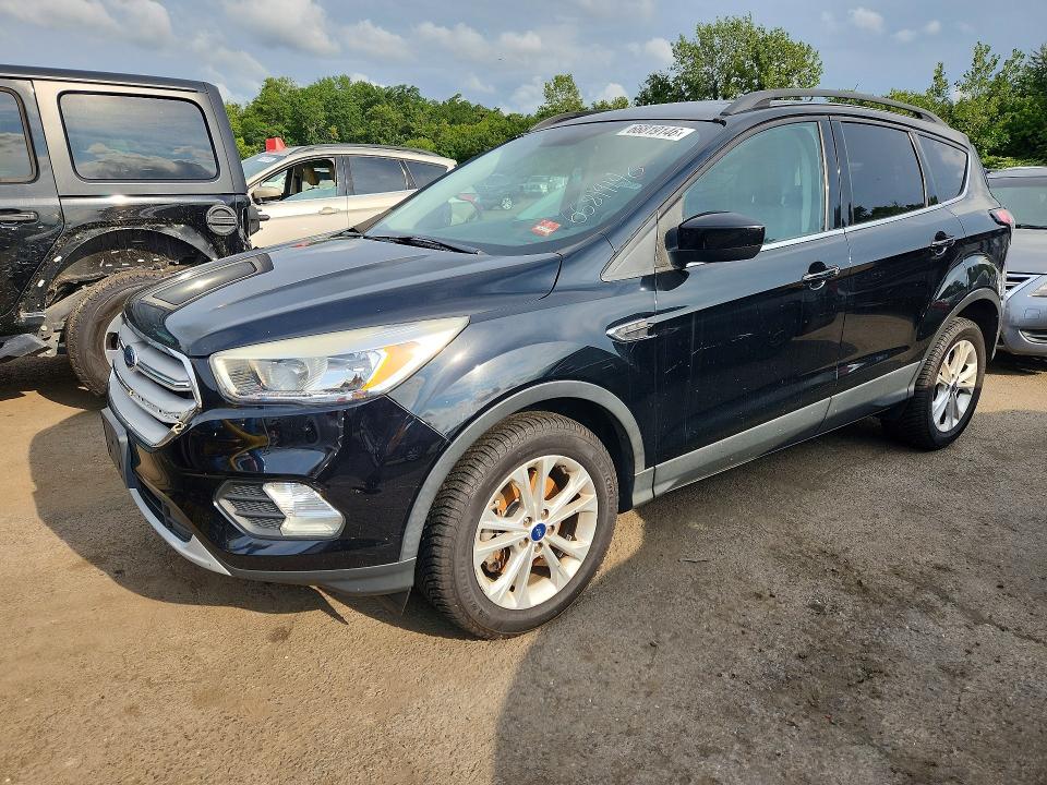 FORD ESCAPE 2018 with VIN 1FMCU9GD6JUC40786 - Photo from auction