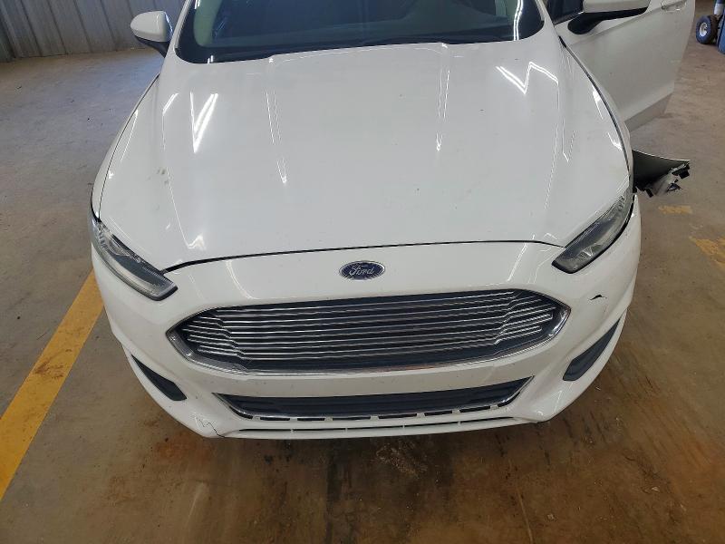 Photo 11 from auction – 2015 FORD FUSION with VIN 3FA6P0G79FR177105
