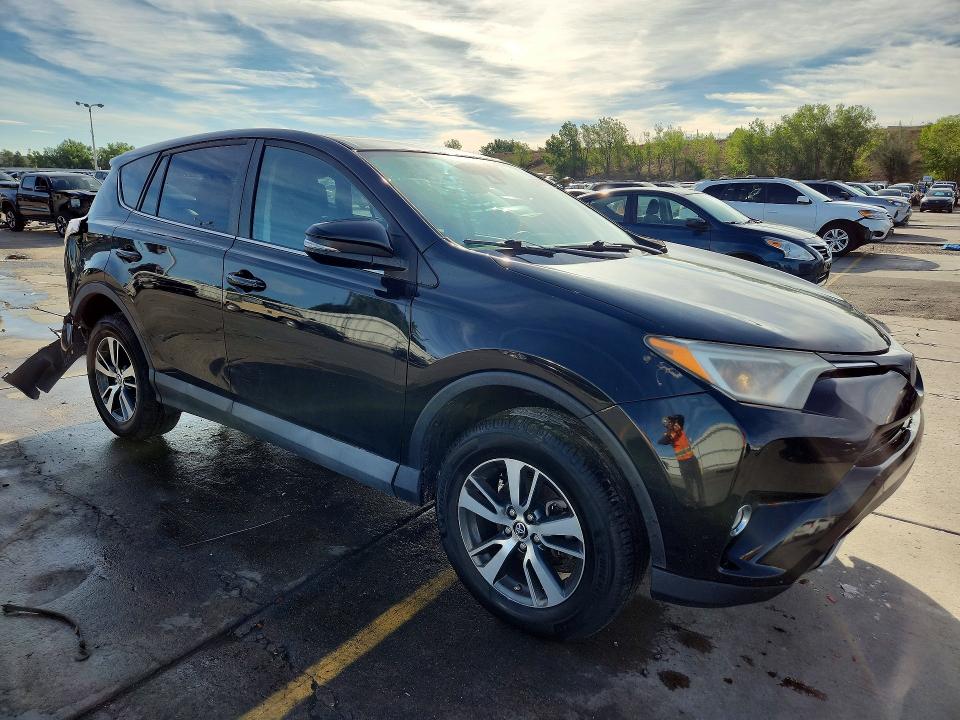Photo 4 from auction – 2018 TOYOTA RAV4 with VIN 2T3RFREV8JW792278