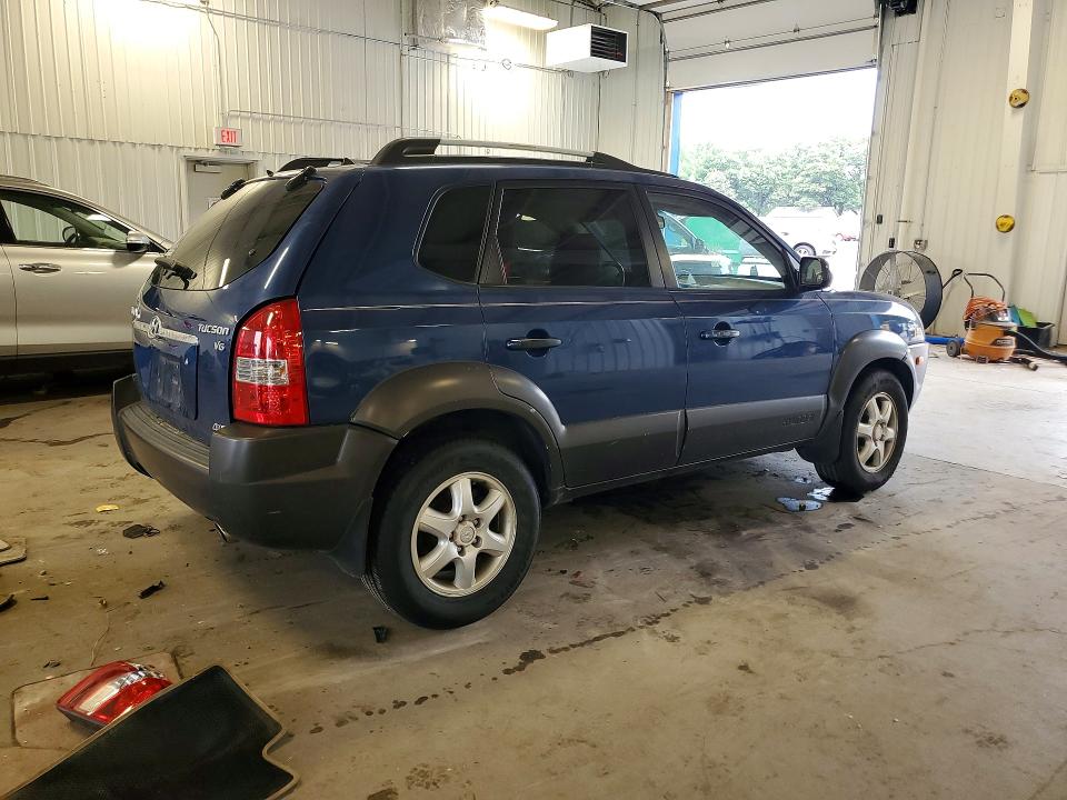 Photo 3 from auction – 2005 HYUNDAI TUCSON with VIN KM8JN72D45U064021