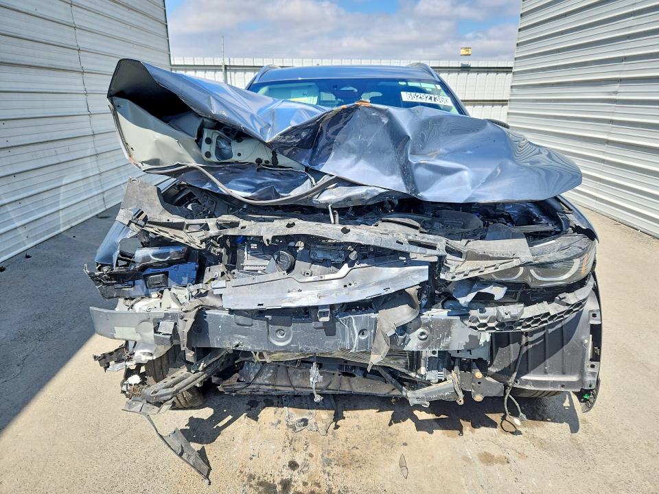 Photo 5 from auction – 2025 MAZDA CX-50 with VIN 7MMVABDM3SN370182