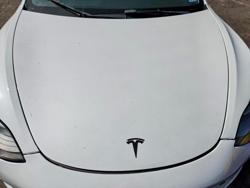 Photo 11 from auction – 2022 TESLA MODEL 3 with VIN 5YJ3E1EA9NF337989