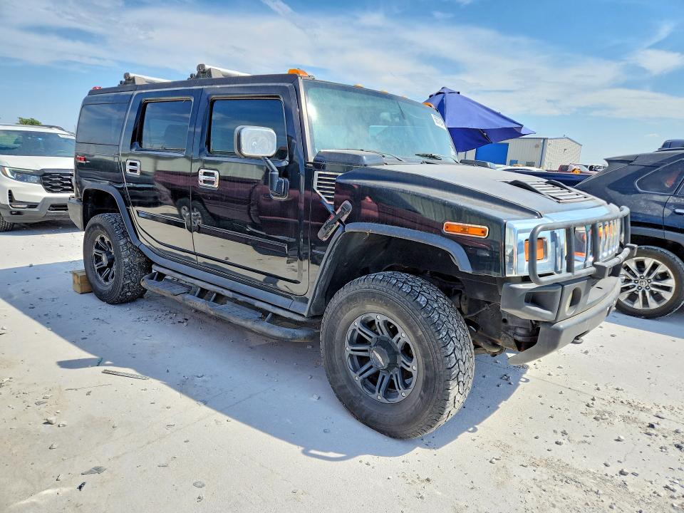 Photo 4 from auction – 2003 HUMMER H2 with VIN 5GRGN23U53H120083