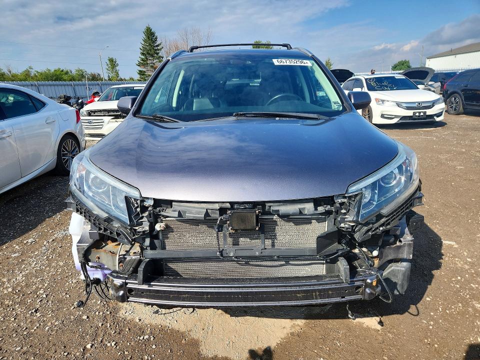 Photo 5 from auction – 2016 HONDA CR-V with VIN 5J6RM4H98GL800697