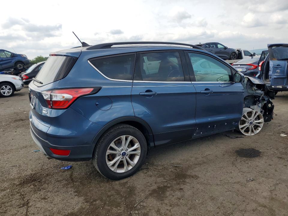 Photo 3 from auction – 2018 FORD ESCAPE with VIN 1FMCU9HD4JUA98601