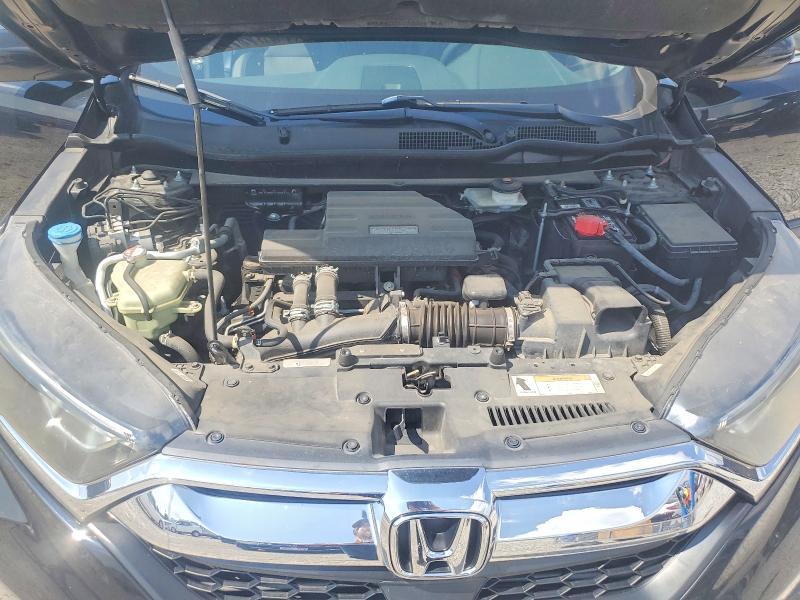 Photo 12 from auction – 2017 HONDA CR-V with VIN 7FARW1H83HE000145