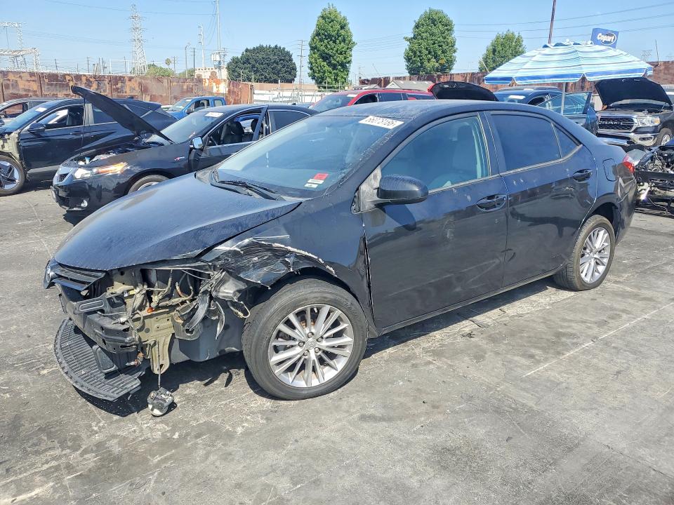 TOYOTA COROLLA 2014 with VIN 5YFBURHE2EP085003 - Photo from auction